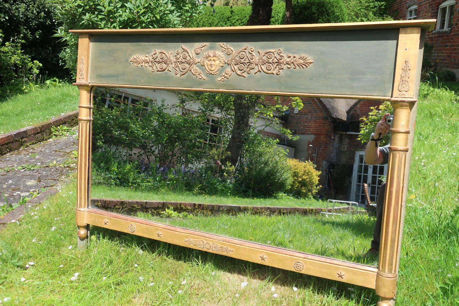 Painted and gilt landscape mirror