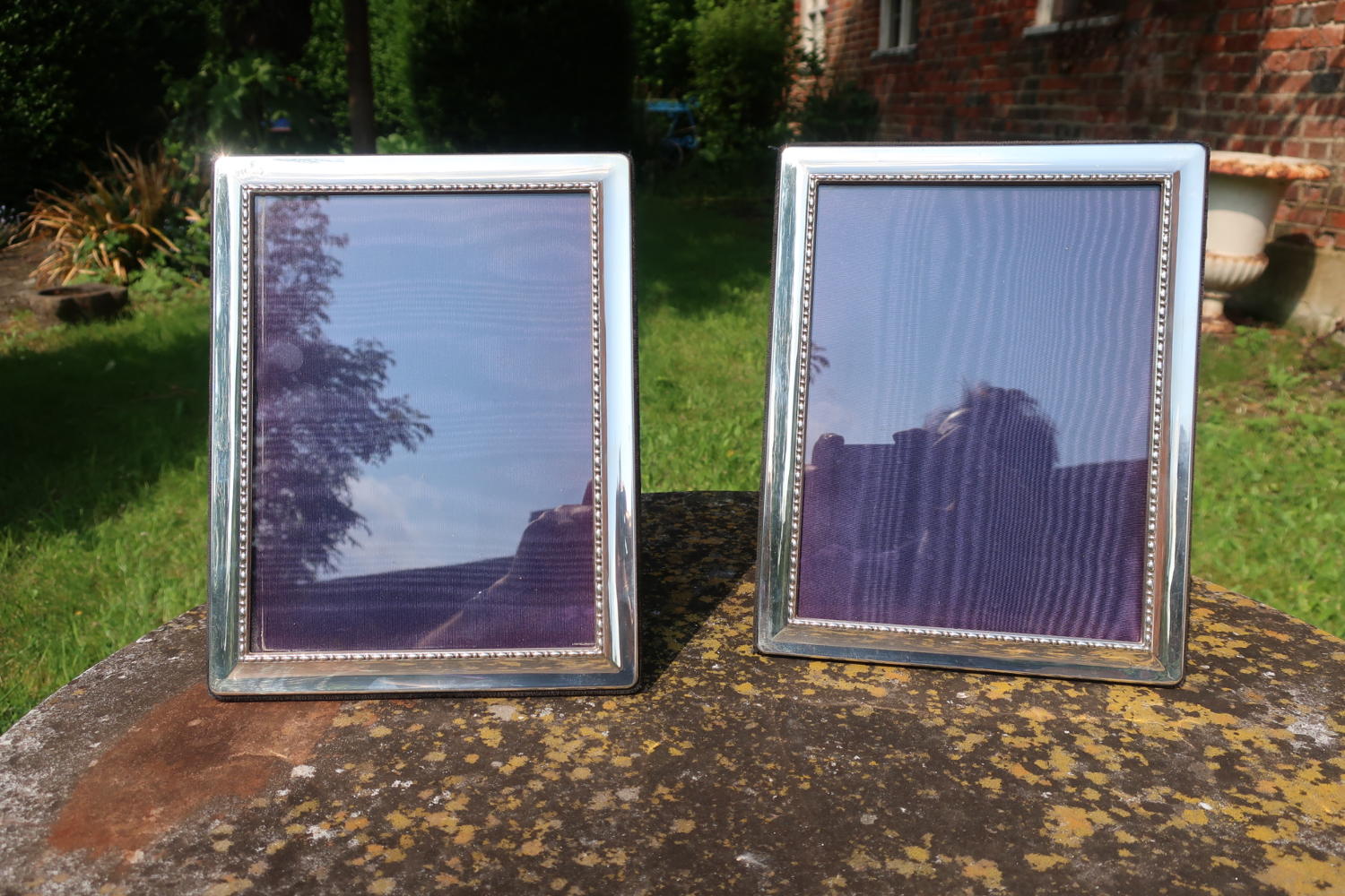 Pair of silver photo frames