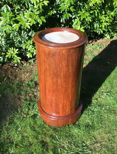 Cylindrical mahogany bedside table