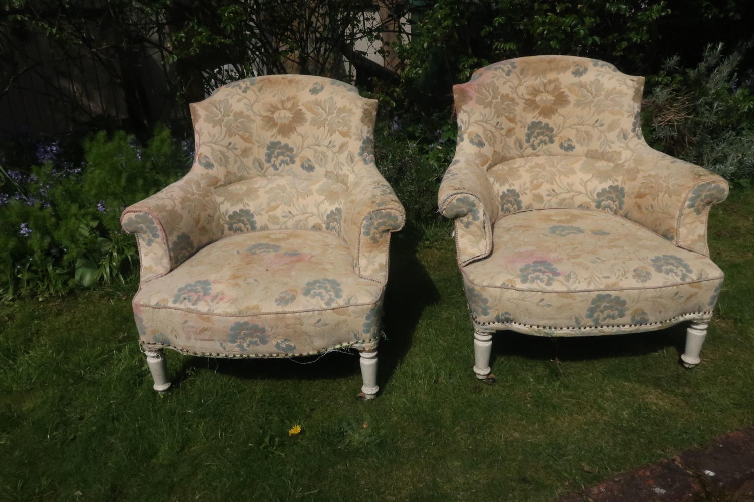 Pair of French upholstered armchairs