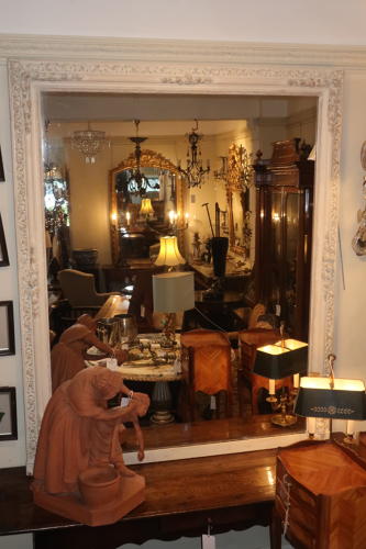Large carved and painted mirror