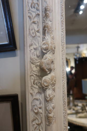 Large carved and painted mirror
