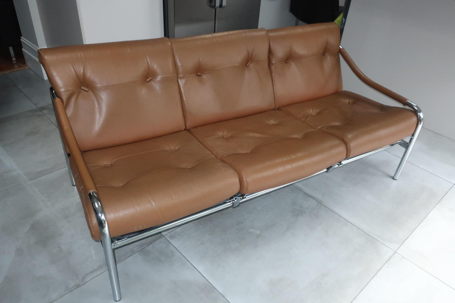 Pieff three seater tan leather sofa