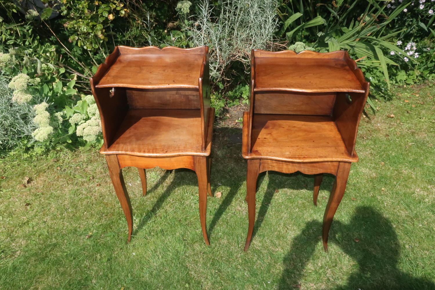 Pair of walnut bedside tables