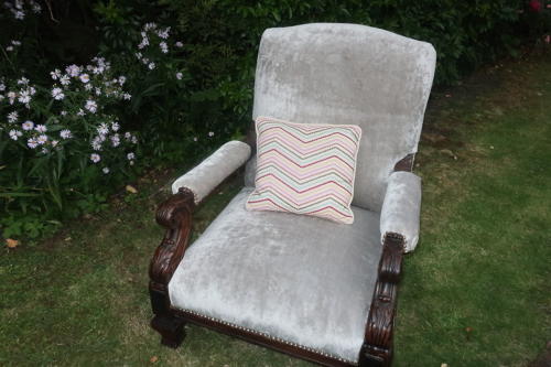 Carved walnut armchair