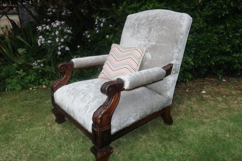 Carved walnut armchair