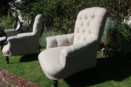 Pair of large button back armchairs
