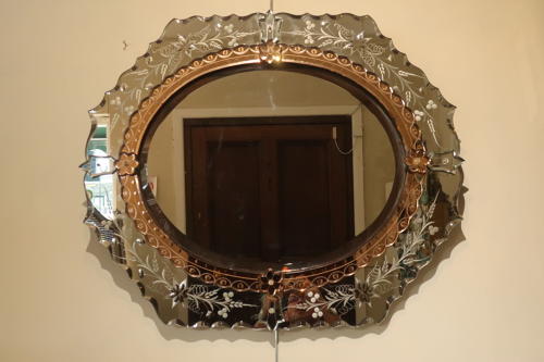 An etched Venitian mirror.