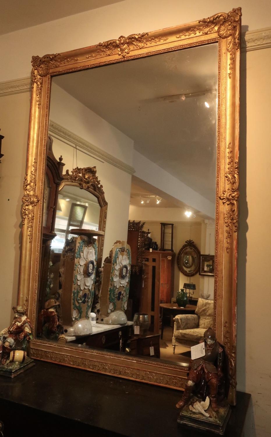 Very large antique gilt mirror