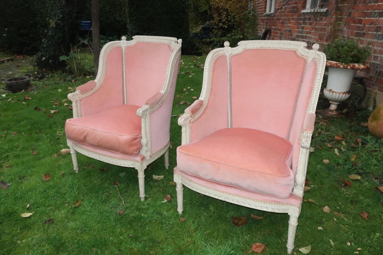 Pair of carved Bergere armchairs