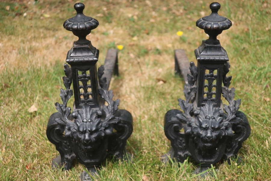 Pair of caste iron fire dogs