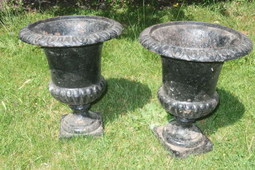 Pair of caste iron jardinieres