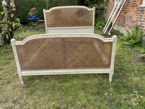 Kingsize caned bed