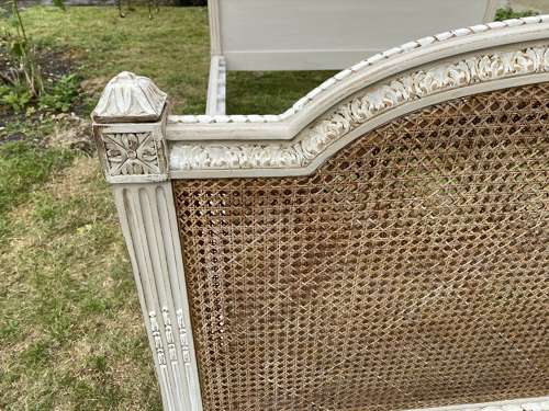 Kingsize caned bed