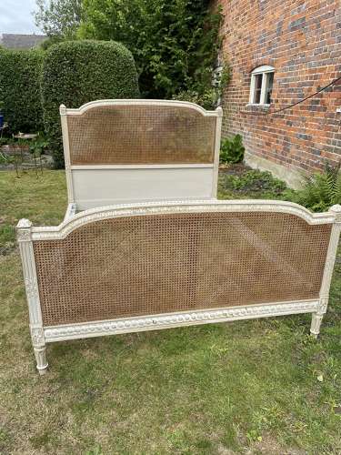 Kingsize caned bed