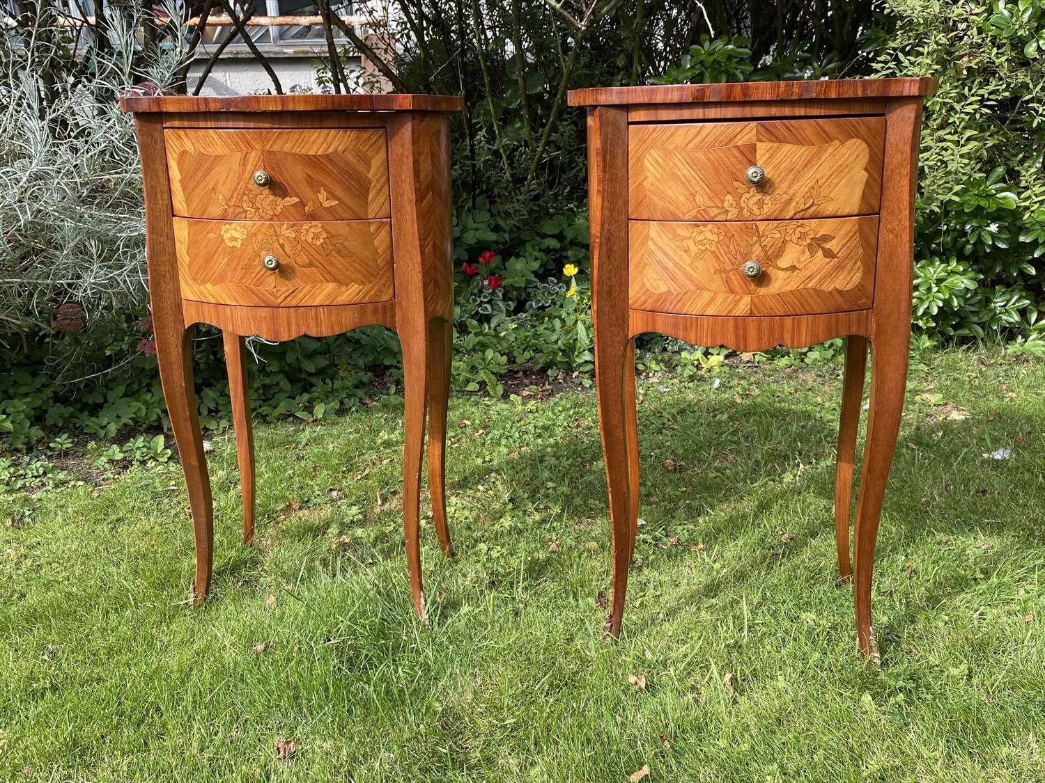 A pair of French marquetry bedside tables