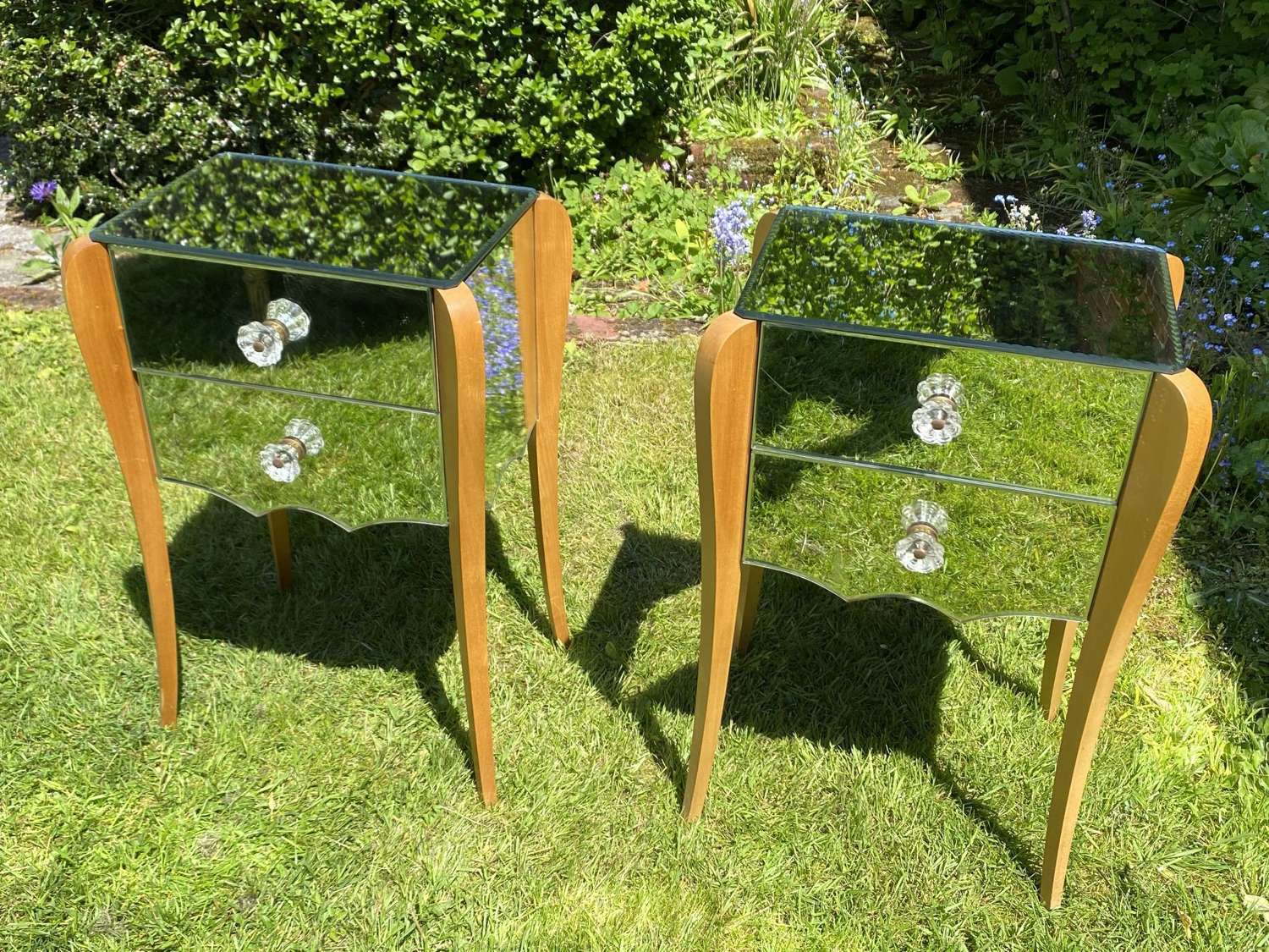 Pair of mid century mirrored bedside tables