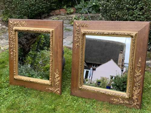 Pair of oak and gilt mirrors