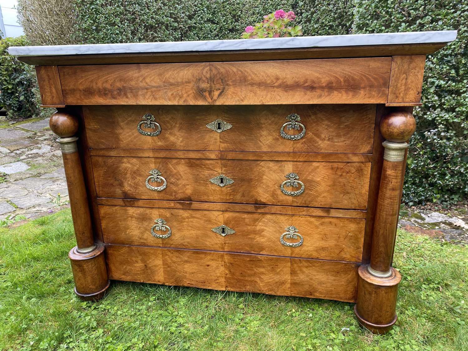 French Empire commode in figured walnut