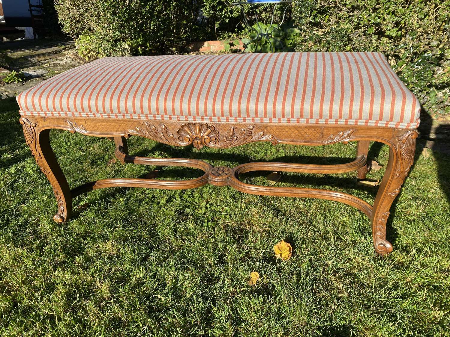 Carved walnut stool
