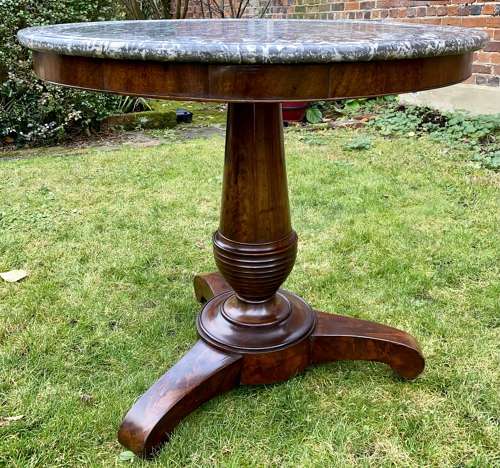 Flame mahogany centre table or Gueridon