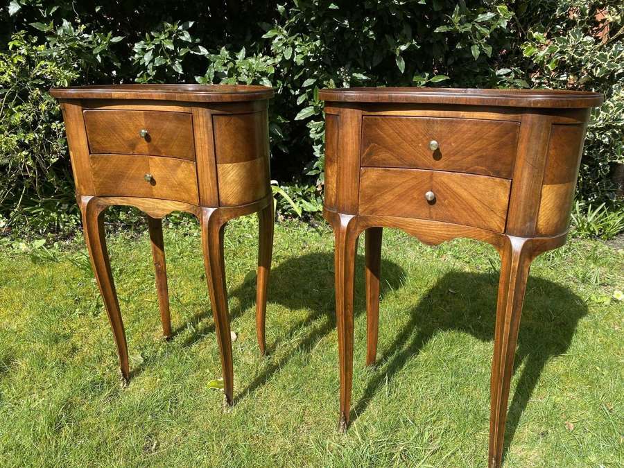 Pair of kidney shaped bedside tables