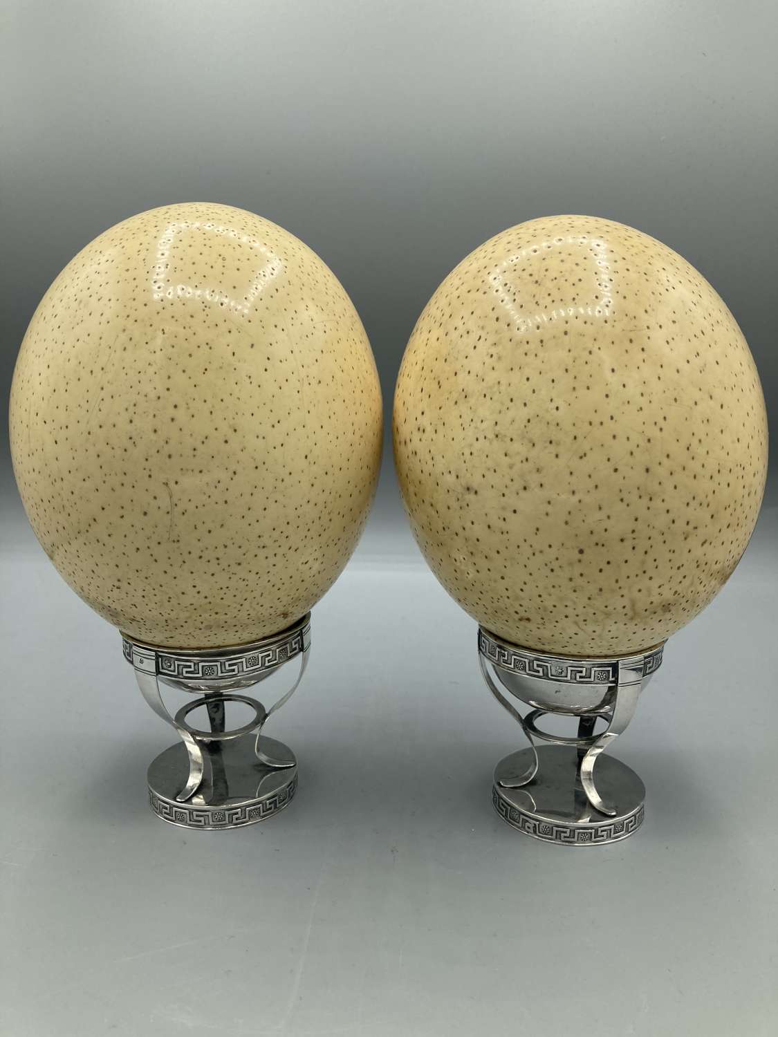A Pair Of Ostrich Eggs on Italian Silver Stands