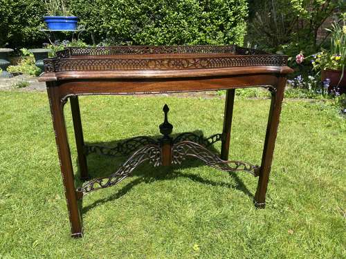 Fretwork silver table in mahogany