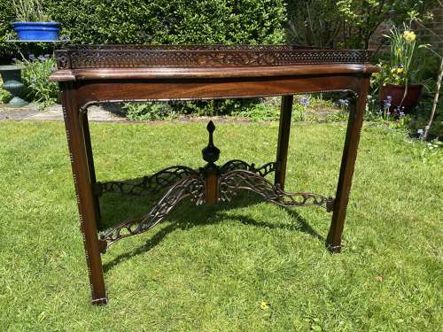 Fretwork silver table in mahogany