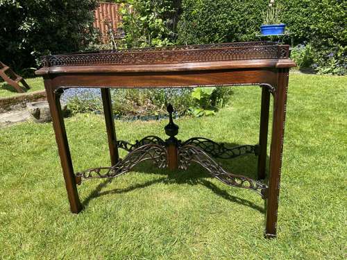 Fretwork silver table in mahogany
