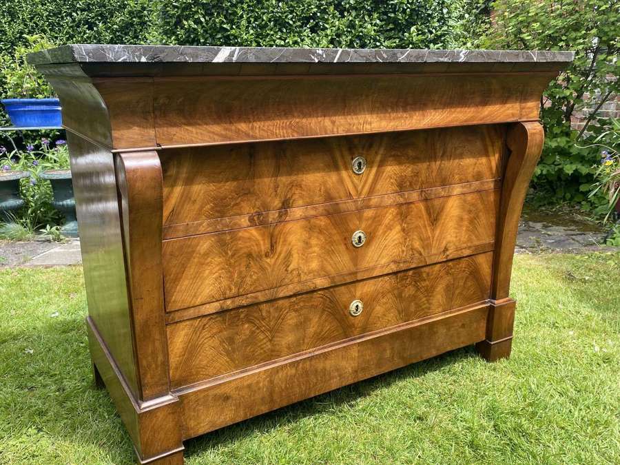 French Empire commode in figured walnut