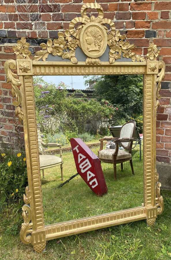 Large carved gilt wood mirror