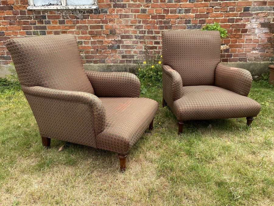 Pair of large upholstered armchairs in walnut