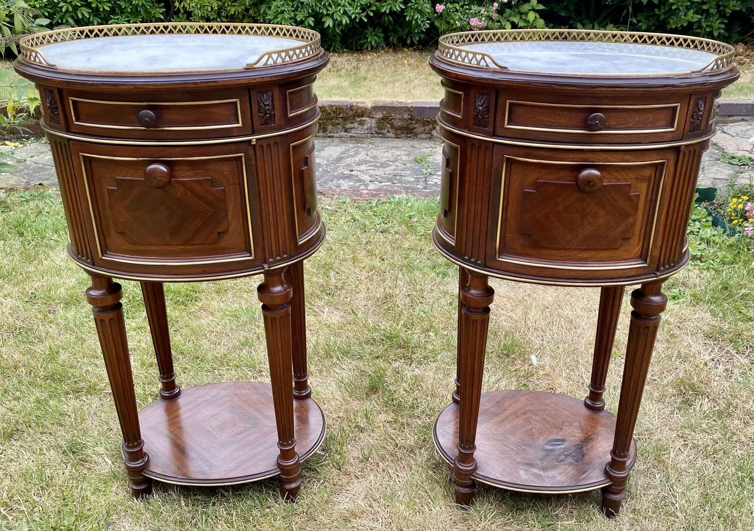 Pair of mahogany brass inlaid bedside tables