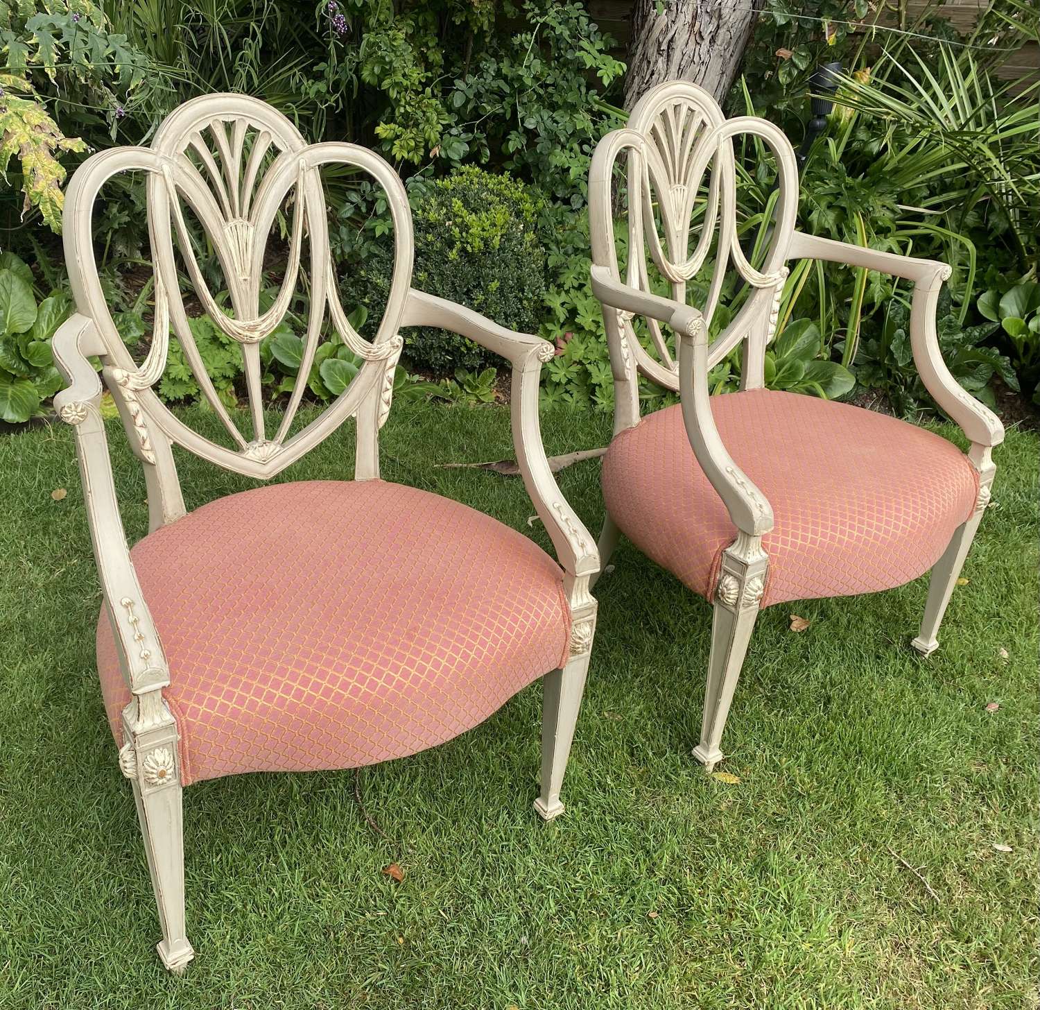 Pair of antique shield back armchairs