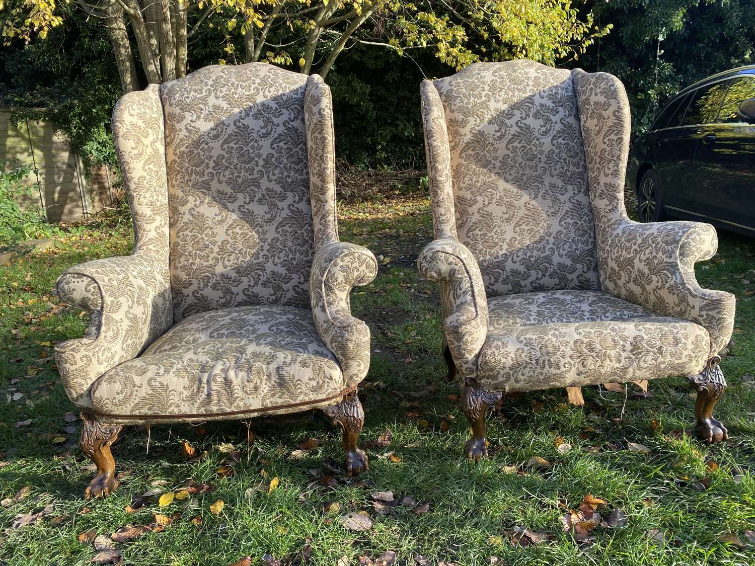 Very large pair of quality wingback armchairs