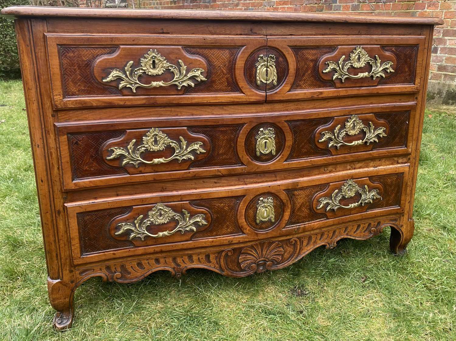18th Century Serpentine fronted commode in cherrywood