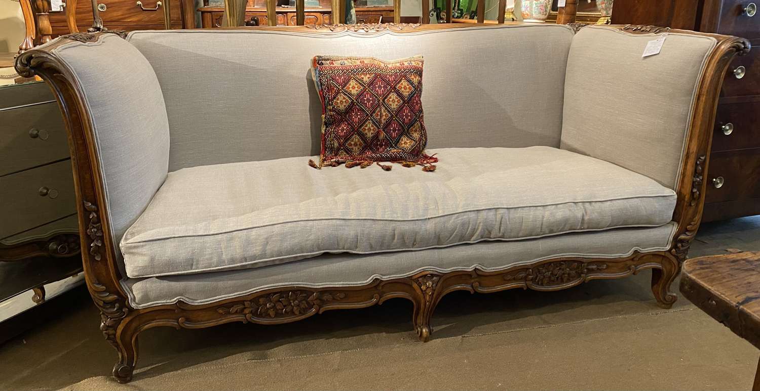 Large, deep, carved sofa
