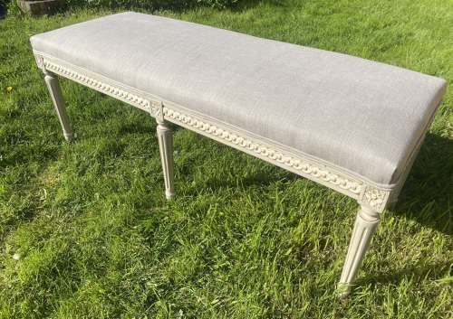 Painted stool in grey linen
