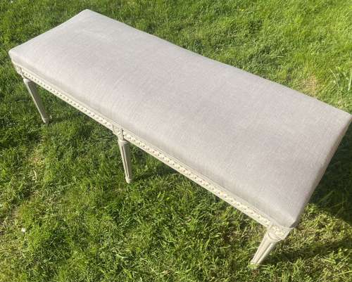 Painted stool in grey linen
