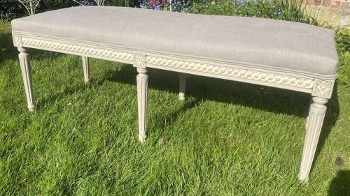 Painted stool in grey linen