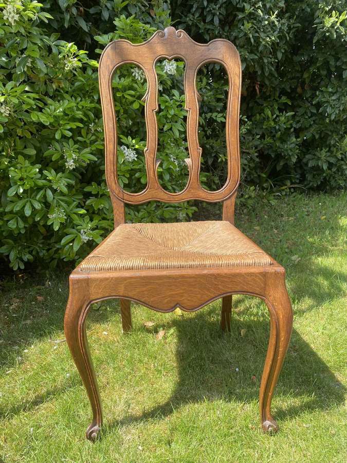 Set of six oak rush seated dining chairs