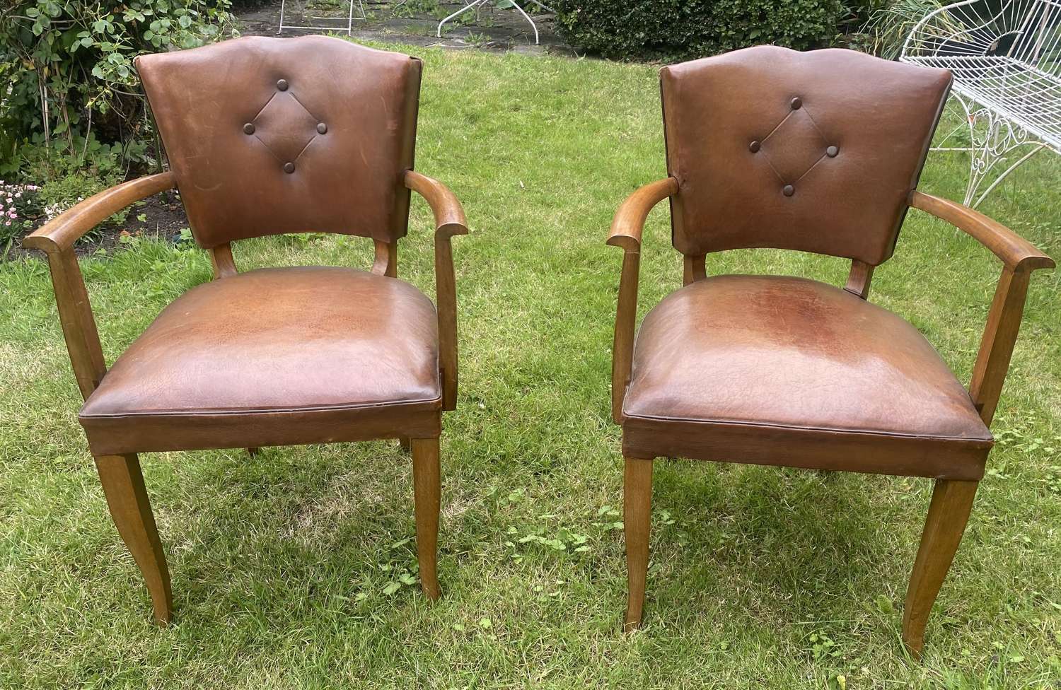 Pair of leather bridge chairs