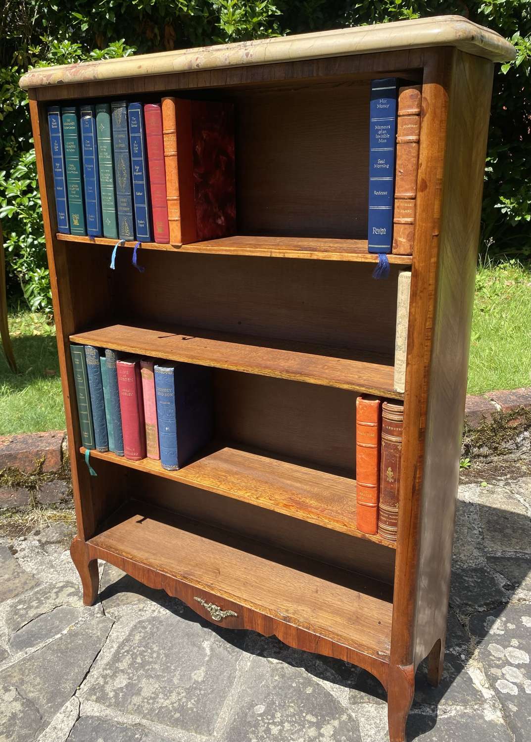 Small marble topped bookcase