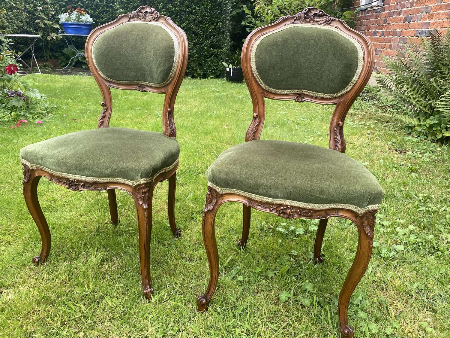 Pair of carved walnut side chairs