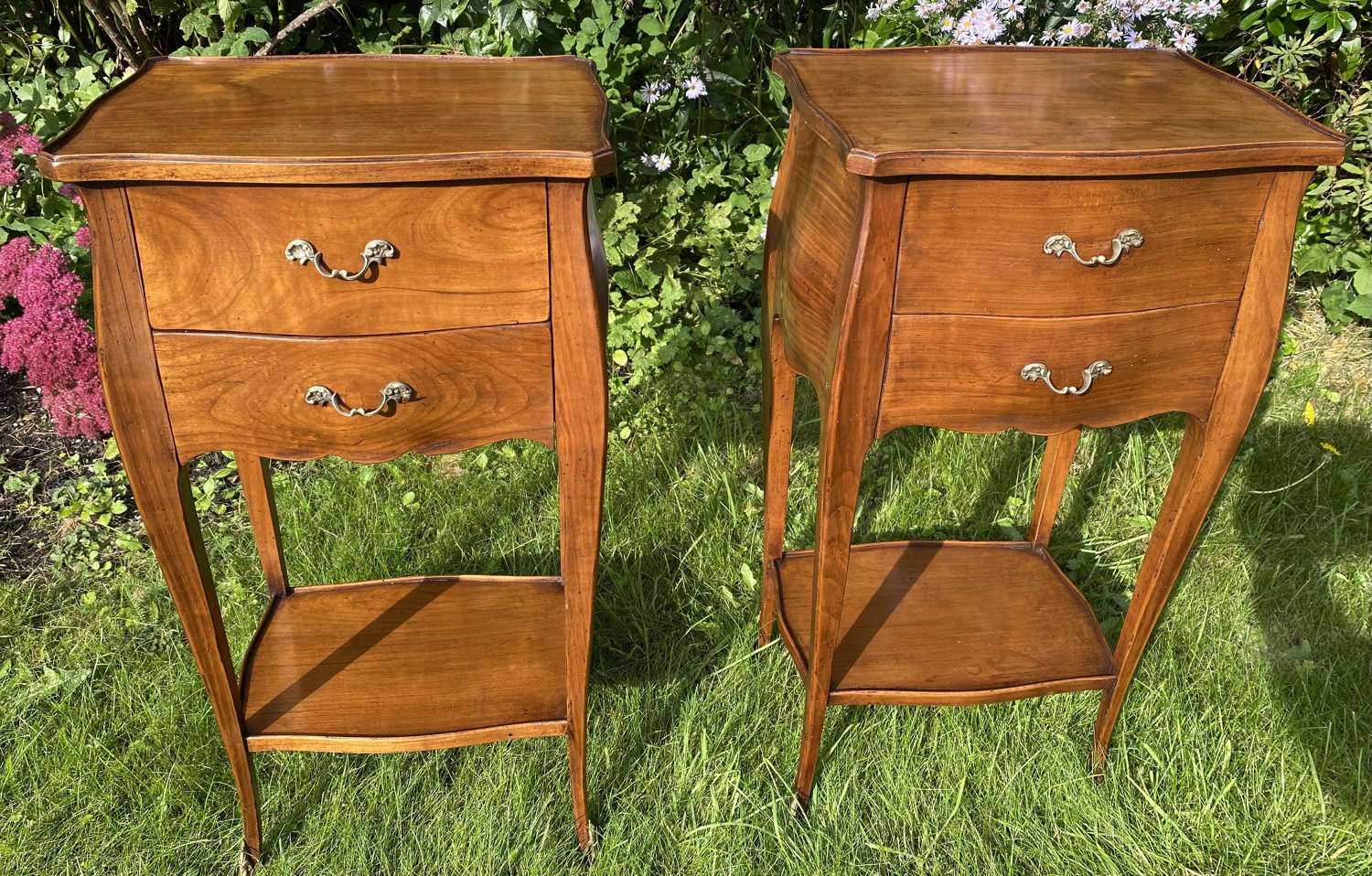 Pair of bombe Cherrywood bedside tables