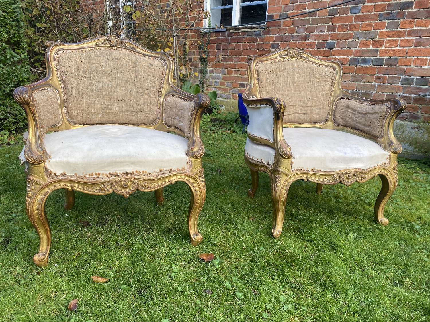 Pair of English gilt armchairs