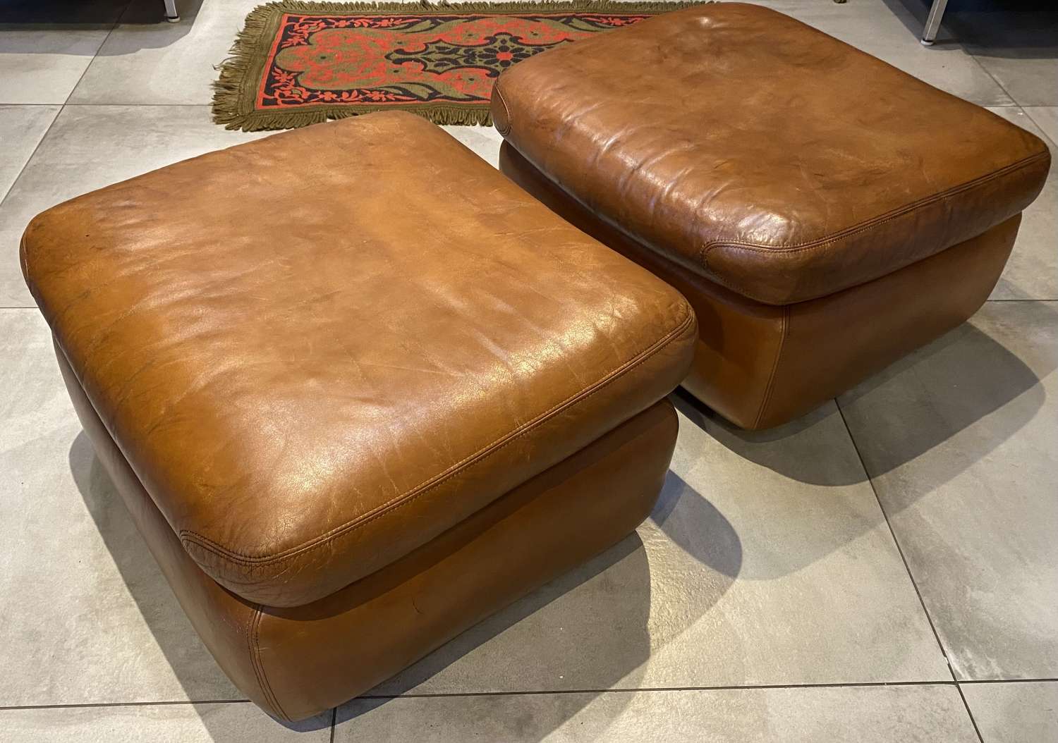 Pair of large mid century ottomans or stools