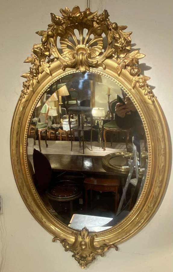 19th Century oval gilt mirror