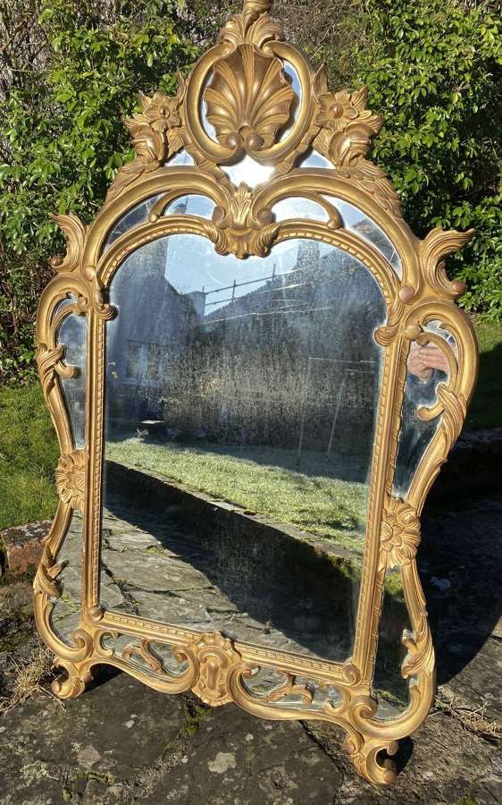 Carved giltwood French mirror